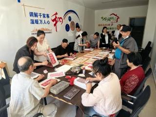 潍坊昌乐：墨香拓古韵 非遗进社区 ——基层文化建设指导员巧手播文脉