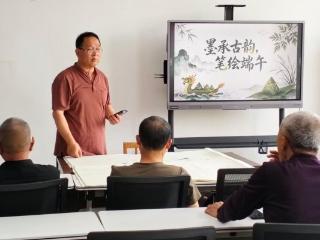 潍坊安丘：墨承古韵 笔绘端午——文化建设指导员走进社区 挥毫泼墨共品端午文脉