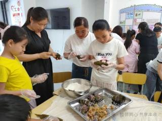 济宁市泗水县泗河街道丰收社区：粽香飘邻里，端午话温情
