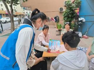 济宁市任城区阜桥街道后铺社区开展“防范抵御邪教 共建平安任城”反邪教宣传活动