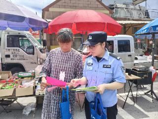 济南市公安局莱芜分局雪野派出所：警民携手反邪教 集市宣传护平安