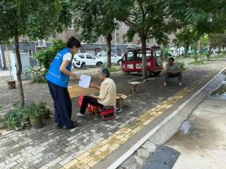 济宁市任城区安居街道李庄社区开展“反对邪教，促进和谐”宣传活动